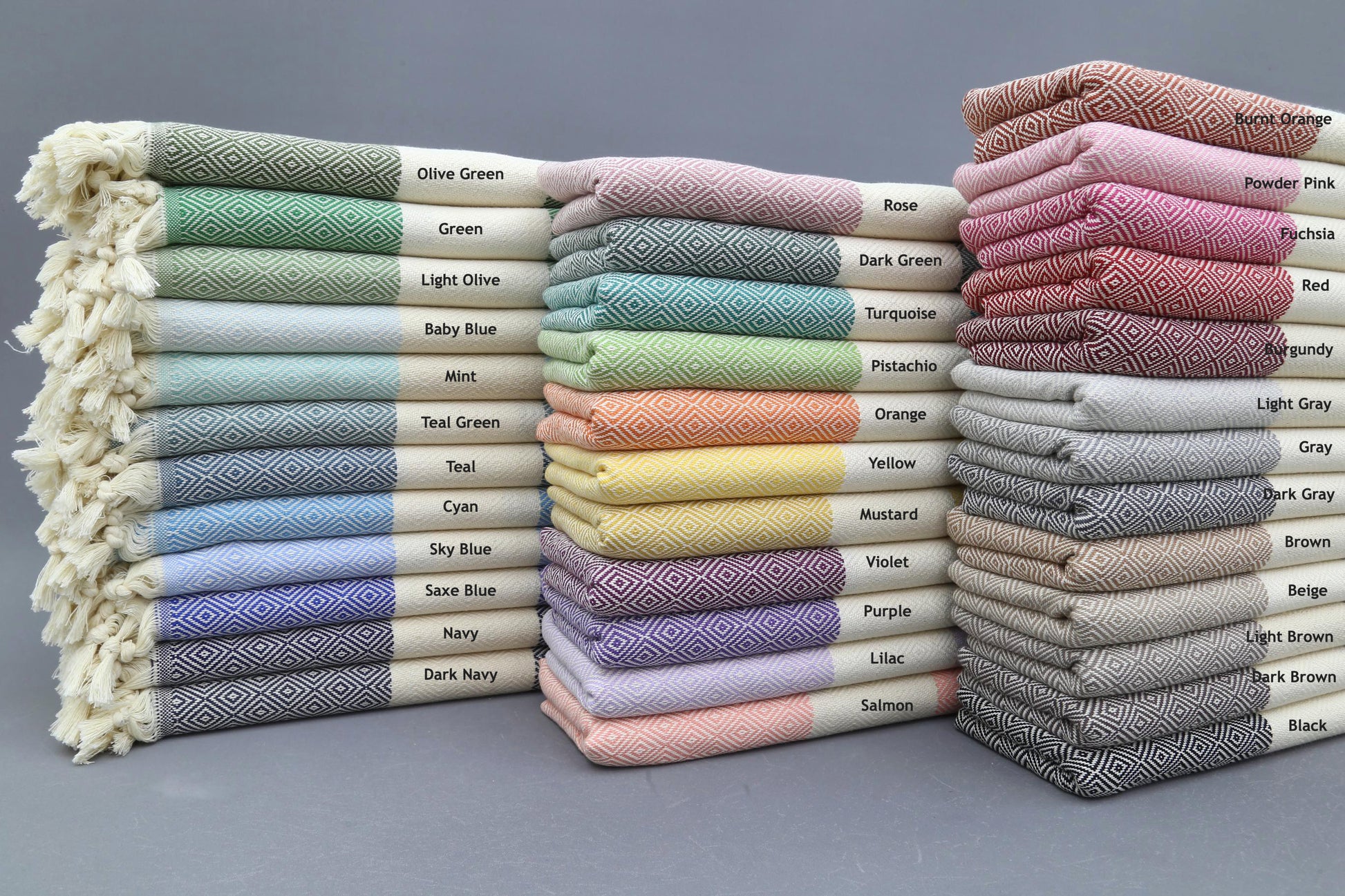 Classic Turkish towels in premium cotton, lightweight, quick-drying, and perfect for travel, beach, spa, and luxe gifts