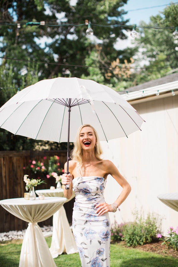 Umbrellas make great fun! Credit: Felix Studios and Milk Glass Productions